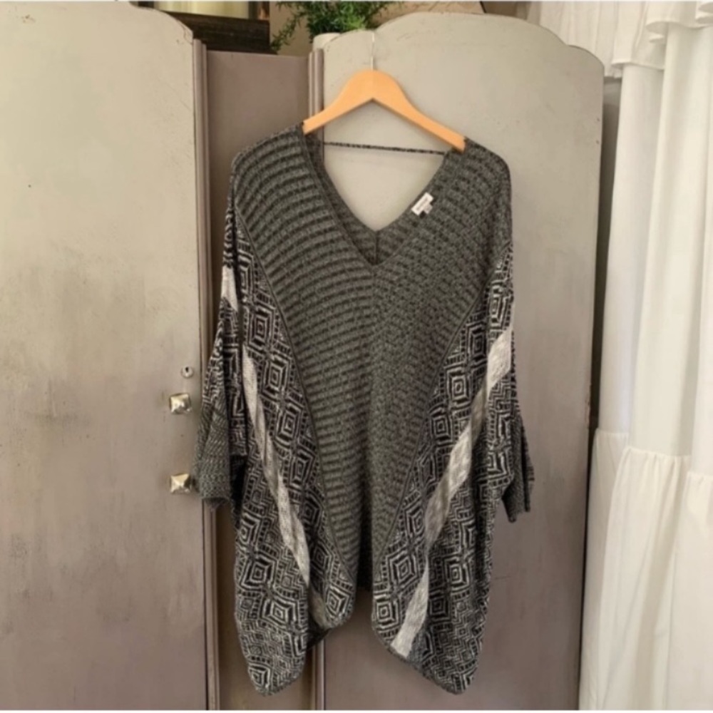 Avenue Shark Bite Hem Knit Sweater